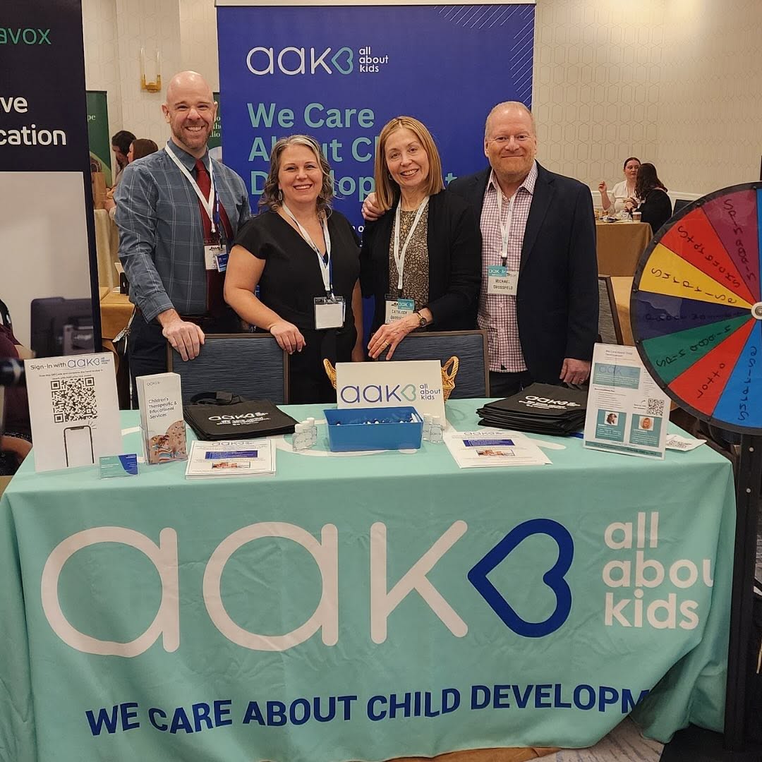 AAKcares at a conference with a table setup